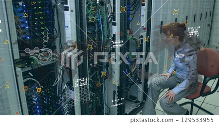 Data processing over globe and world map against caucasian female enginner working at server room Data processing over globe and world map against caucasian female enginner working at server room 129533955