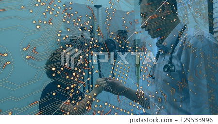 Image of integrated circuit over diverse male doctor and boy Image of integrated circuit over diverse male doctor and boy 129533996