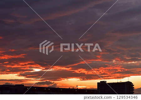 Sunset sky dyed in madder red Sunset sky dyed in madder red 129534346