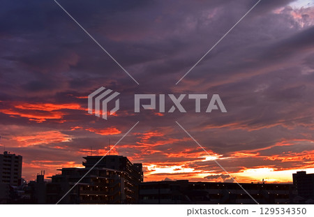 Sunset sky dyed in madder red Sunset sky dyed in madder red 129534350