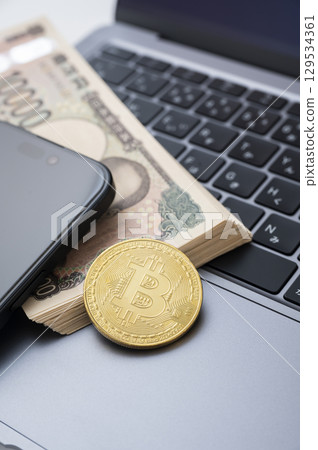Cryptocurrency and cash 129534361