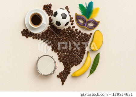 Map of Brazil formed with coffee beans, surrounded by symbols of national culture 129534651