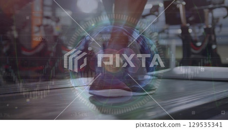 Image of digital brain over legs of woman running on treadmill 129535341