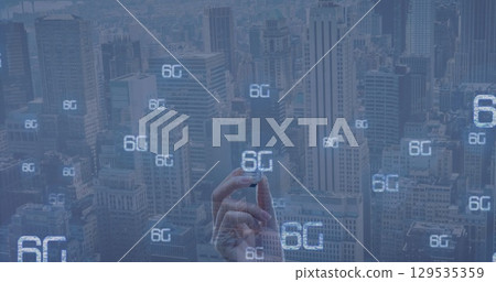 Image of 6g and hand of caucasian woman with bulb over cityscape Image of 6g and hand of caucasian woman with bulb over cityscape 129535359