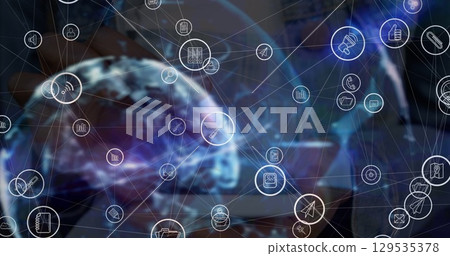 Image of network of connections with social media icons over globe 129535378