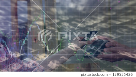 Image of graphs over hands of caucasian people using payment terminal Image of graphs over hands of caucasian people using payment terminal 129535426