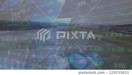 Image of financial data and graphs over landscape Image of financial data and graphs over landscape 129535633