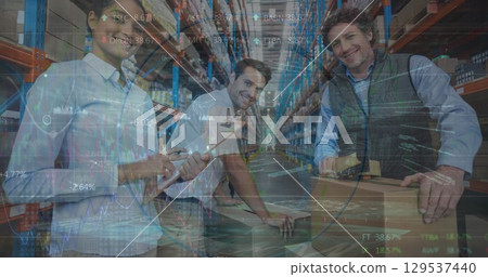 Image of financial graphs over diverse female and male warehouse workers 129537440