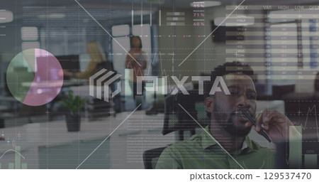 Image of data processing over african american businessman in office 129537470