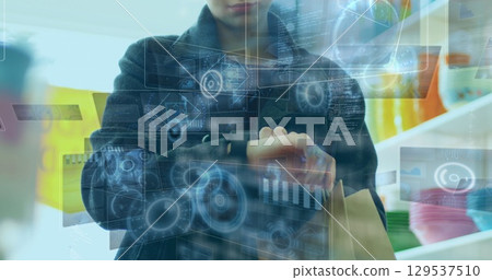 Image of data processing over woman checking smartwatch 129537510