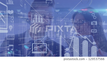 Image of icons and financial data over caucasian businesspeople working in office Image of icons and financial data over caucasian businesspeople working in office 129537566