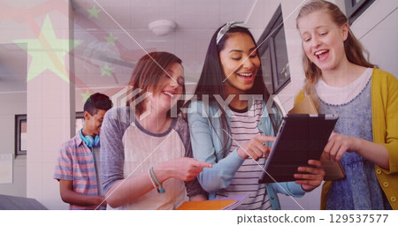 Image of flag of china over happy diverse girls using tablet at school 129537577