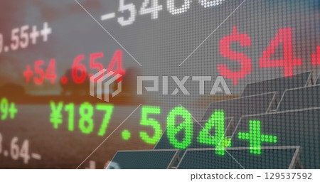 Image of financial data and graphs over solar panels Image of financial data and graphs over solar panels 129537592