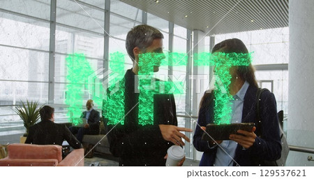 Image of particles over male scientist with robot Image of particles over male scientist with robot 129537621
