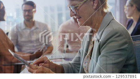 Image of financial data processing over diverse group of business people 129537891