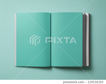 Open book with blank pages on a turquoise background. Ideal for concepts of creativity 129538165