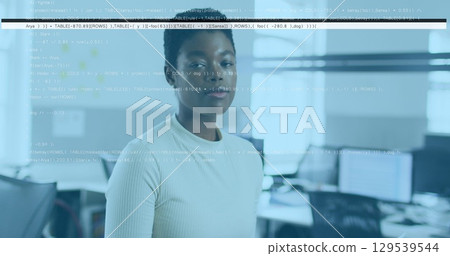 Image of data processing over african american businesswoman with documents in office Image of data processing over african american businesswoman with documents in office 129539544