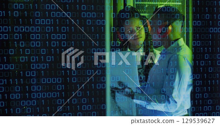 Image of data processing over african american couple server room workers using headphones Image of data processing over african american couple server room workers using headphones 129539627