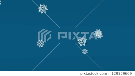 Digital image of snowflakes icons falling against copy space on blue background Digital image of snowflakes icons falling against copy space on blue background 129539669