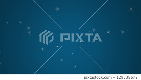Digital image of snowflakes icons falling against copy space on blue background Digital image of snowflakes icons falling against copy space on blue background 129539672
