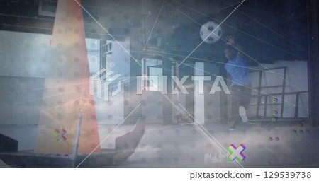 Image of network of connections over clouds and african american man kicking ball Image of network of connections over clouds and african american man kicking ball 129539738