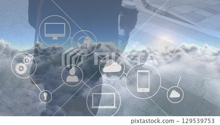 Image of network of connections over clouds and midsection of african american businessman Image of network of connections over clouds and midsection of african american businessman 129539753