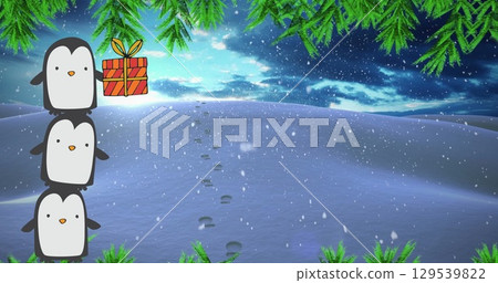 Image of christmas greetings on tag over winter landscape Image of christmas greetings on tag over winter landscape 129539822