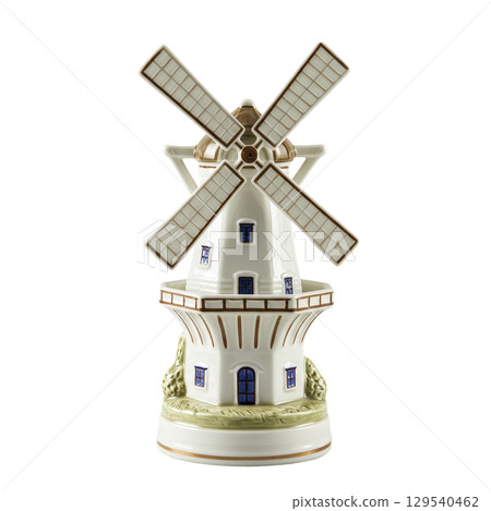 Traditional white and blue porcelain dutch windmill figurine as a classic collectible souvenir 129540462