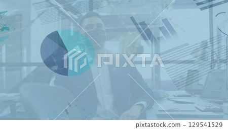 Image of data processing over diverse business people with face masks in office Image of data processing over diverse business people with face masks in office 129541529