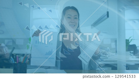 Image of data processing over asian businesswoman smiling in office 129541533