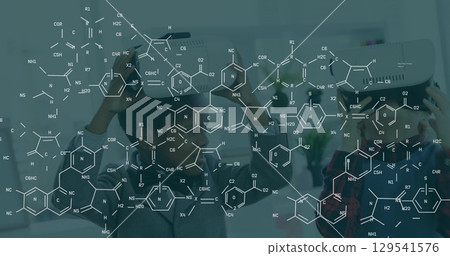Image of chemical formulas over african american boy using vr headset Image of chemical formulas over african american boy using vr headset 129541576