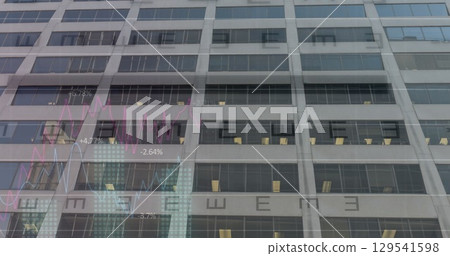 Image of financial graphs and data over office building 129541598
