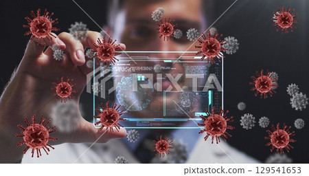Image of red virus cells over caucasian male doctor with digital card with virus data 129541653