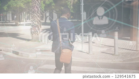 Image of network of connections over african american businessman and clouds 129541675