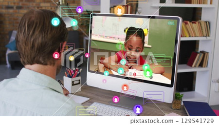 Image of social media icons falling over two caucasian man using computer Image of social media icons falling over two caucasian man using computer 129541729