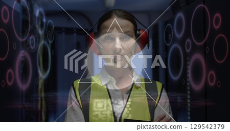 Image of digital data processing and qr code over caucasian female server room worker 129542379