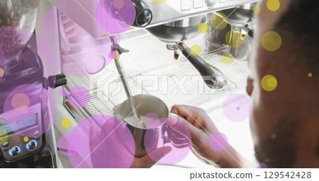 Image of falling purple dots over barista making coffee 129542428