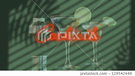 Image of red neon cocktail text over shadows on cocktails 129542449