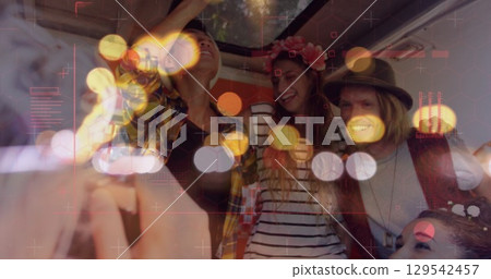 Image of digital data processing and glowing lights over diverse people in car 129542457