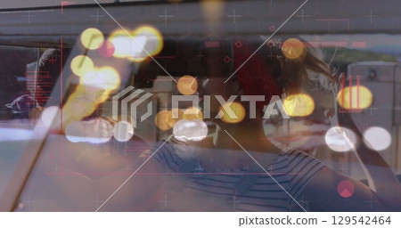 Image of digital data processing over two caucasian people in car Image of digital data processing over two caucasian people in car 129542464