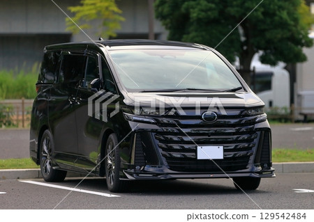 Image of a luxury black minivan Image of a luxury black minivan 129542484