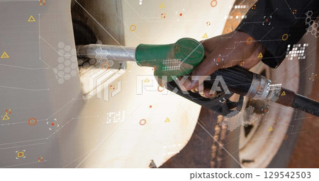Image of data processing and globe over african american men refueling 129542503