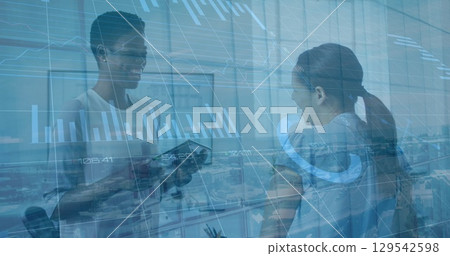 Image of financial data processing and cityscape over diverse business people Image of financial data processing and cityscape over diverse business people 129542598
