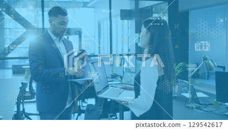 Image of data processing over diverse business people in office Image of data processing over diverse business people in office 129542617
