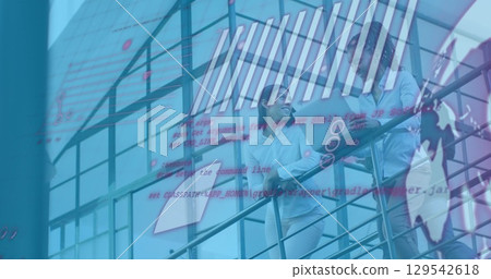 Image of financial data processing over diverse business people in office 129542618