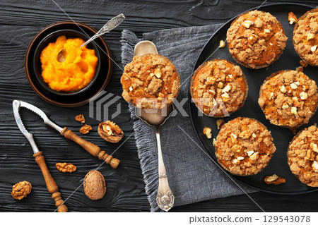sweet potato muffins with streusel nut topping sweet potato muffins with streusel nut topping 129543078