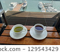 Tea on the terrace overlooking the harbor 129543429