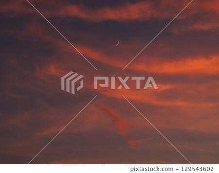 Bright red sunset clouds Bright red sunset clouds 129543602