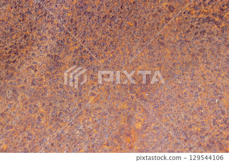 metal surface made of steel and an alloy of metals, the details of a part of a metal alloy structure covered with red rust spots 129544106