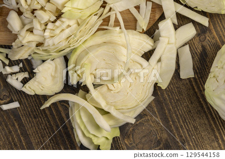one white cabbage details of fresh cabbage chopped into small pieces for convenience of cooking one white cabbage details of fresh cabbage chopped into small pieces for convenience of cooking 129544158